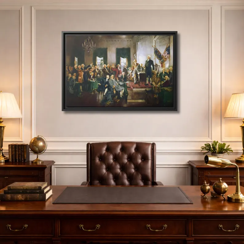 Scene at the Signing of the Constitution framed canvas hung above a mahogany executive desk in a paneled study with brass lamps and a tufted leather chair