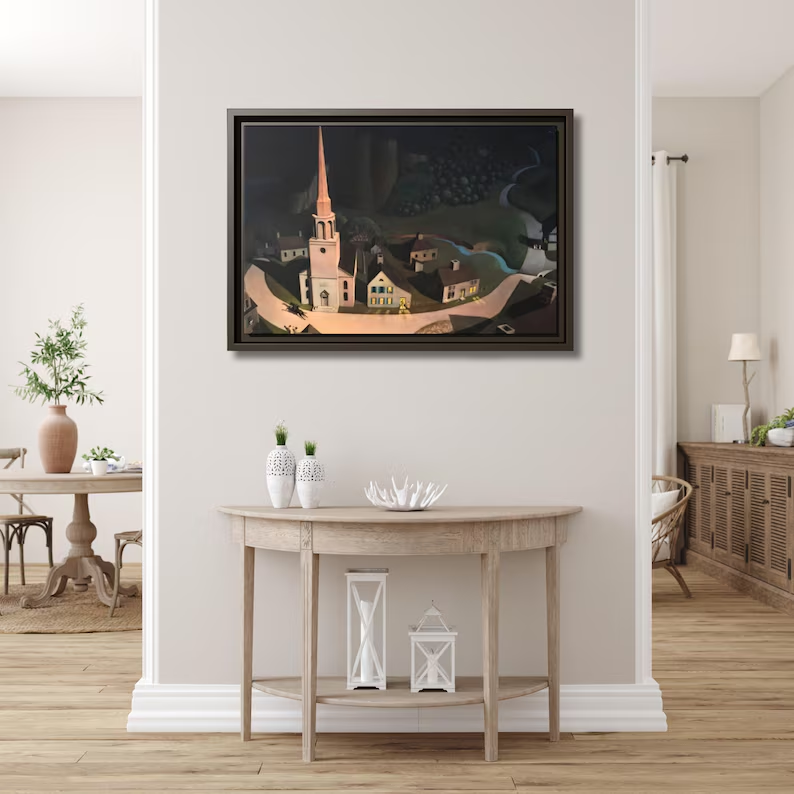 The Midnight Ride of Paul Revere framed canvas above a light demi-lune console table in a bright airy entryway
