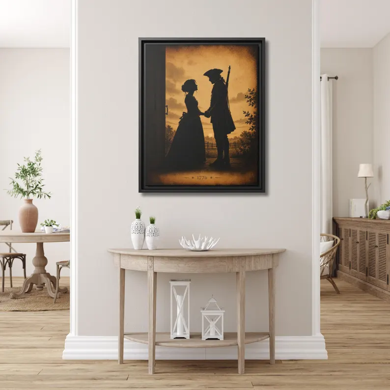 Colonial Soldier Farewell 1776 silhouette framed canvas above a light demi-lune console table in a bright airy entryway