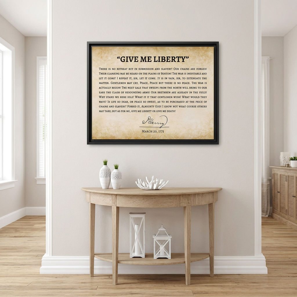 Give Me Liberty speech framed canvas hung above a light oak demi-lune console table in a bright airy entryway
