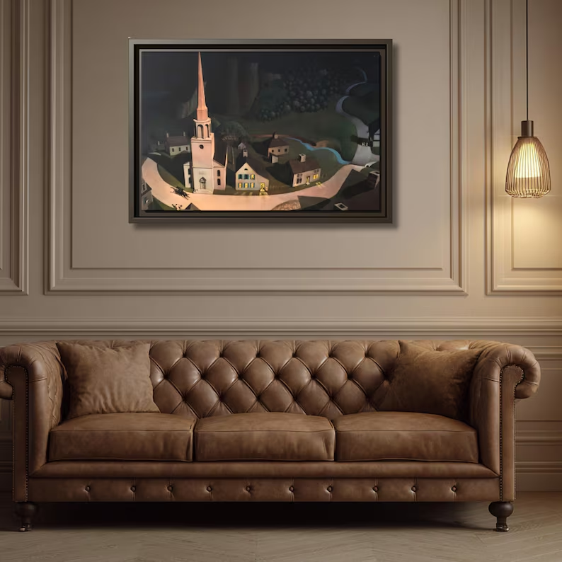 The Midnight Ride of Paul Revere framed canvas above a cognac leather Chesterfield sofa in a paneled study