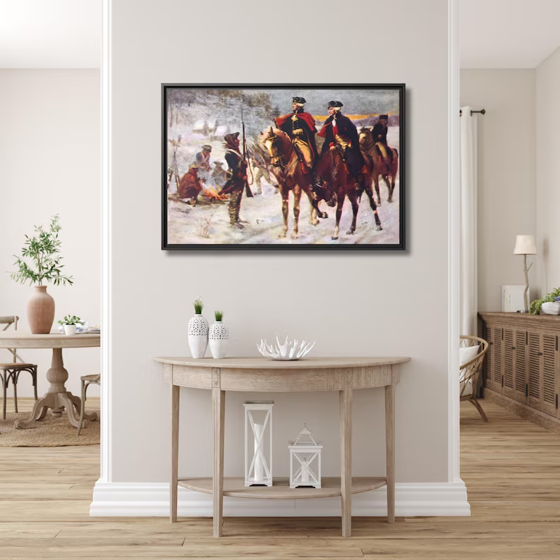 Washington and Lafayette at Valley Forge framed canvas above a light demi-lune console table in a bright airy entryway