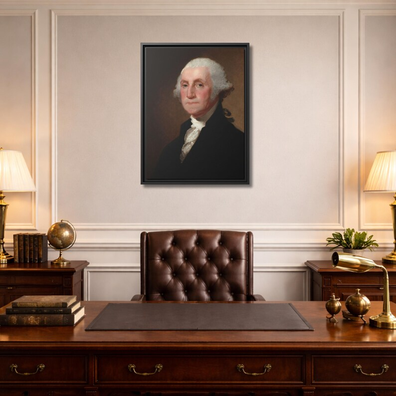Athenaeum Portrait of George Washington framed canvas hung in an executive office with tufted leather chair and brass lamps