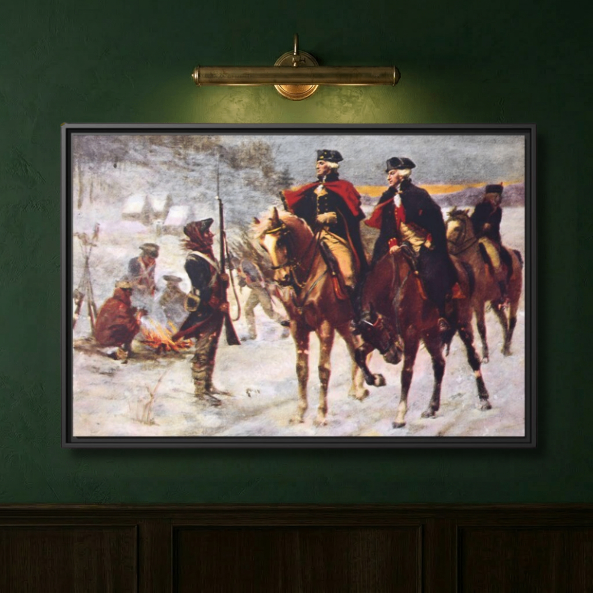 Close-up of Washington and Lafayette at Valley Forge framed canvas on a deep green wall lit by a brass picture light